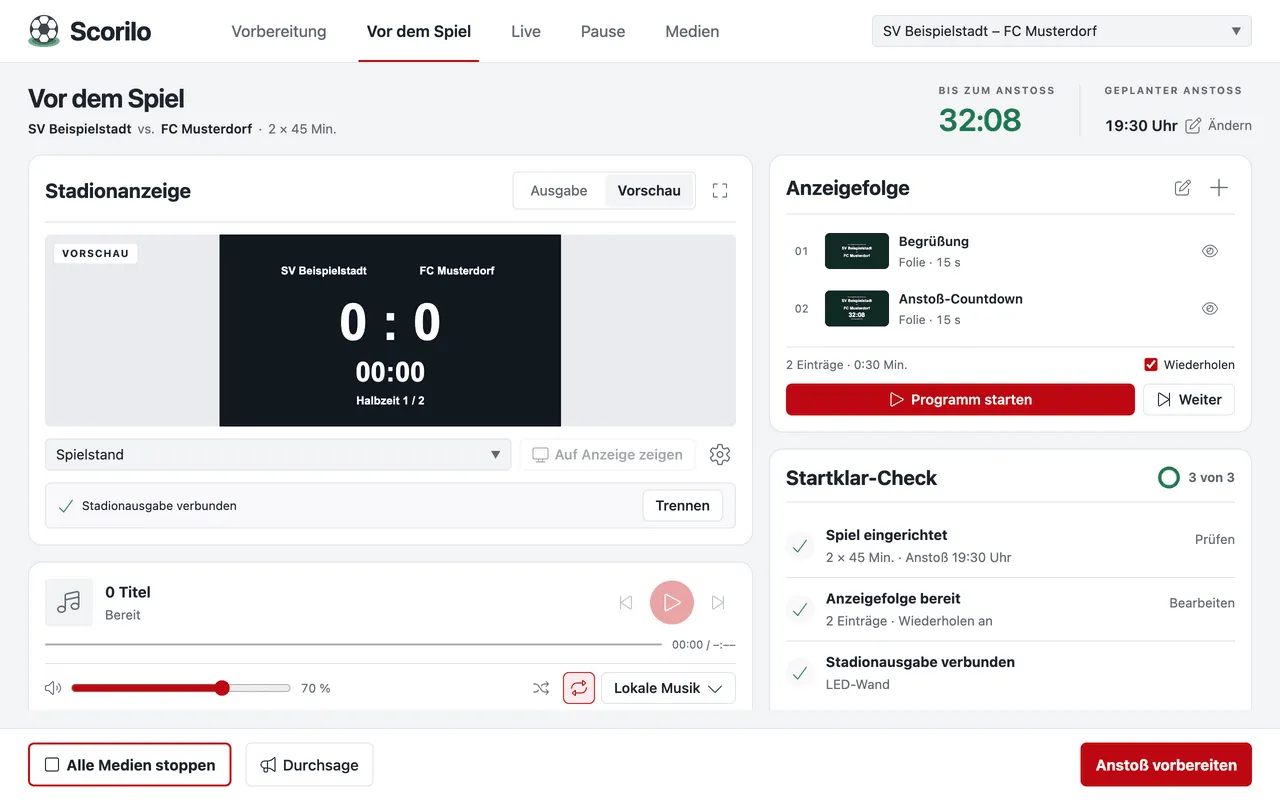 Ansicht „Vor dem Spiel“: Anzeigefolge mit Begrüßung und Anstoß-Countdown, Startklar-Check mit 3 von 3 erledigten Punkten.
